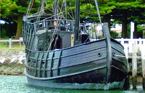 Notorious is treated with a period-correct black varnish made of Stockholm tar and linseed oil. The Mahogany Ship, while larger, may have looked much like this.
